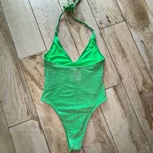 Green, sparkly deep v-neck bodysuit/bathing suit.